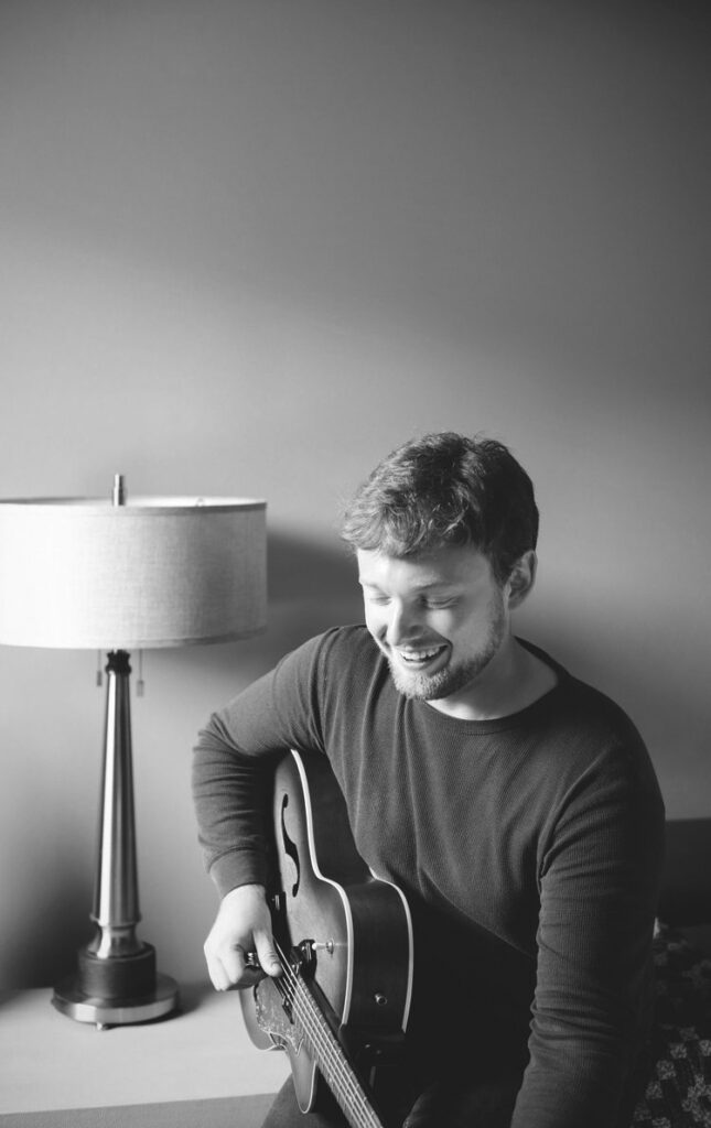 Campbell Davis playing guitar