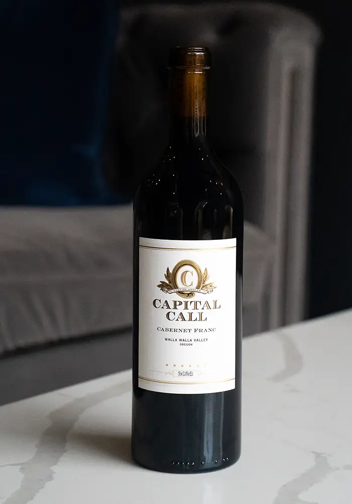 Bottle of Capital Call Cabernet Franc on Table