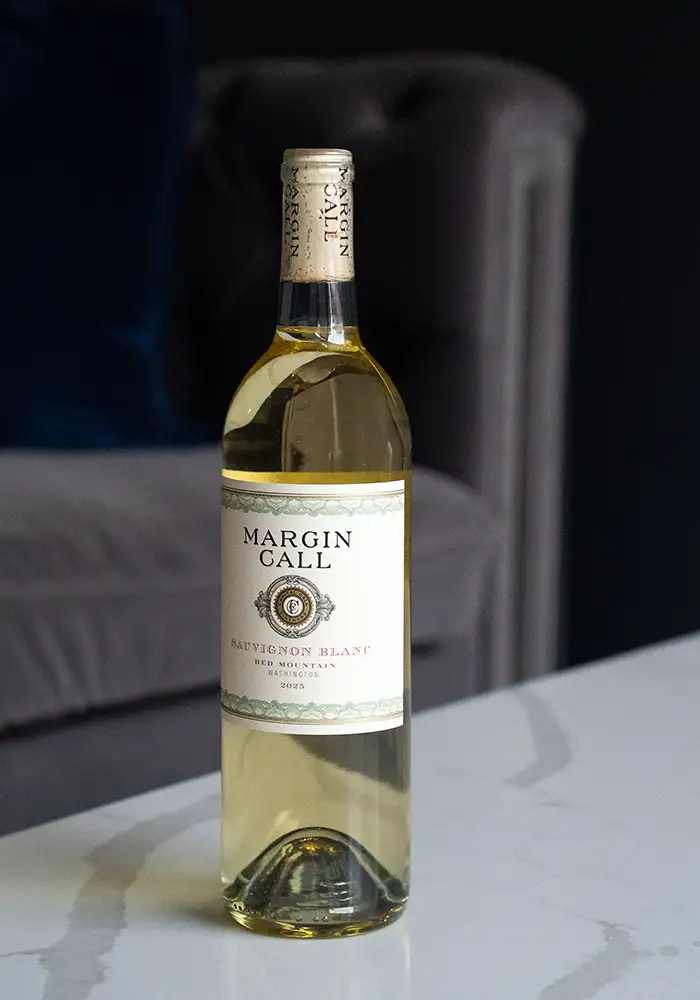 Margin Call Sauvignon blanc on table