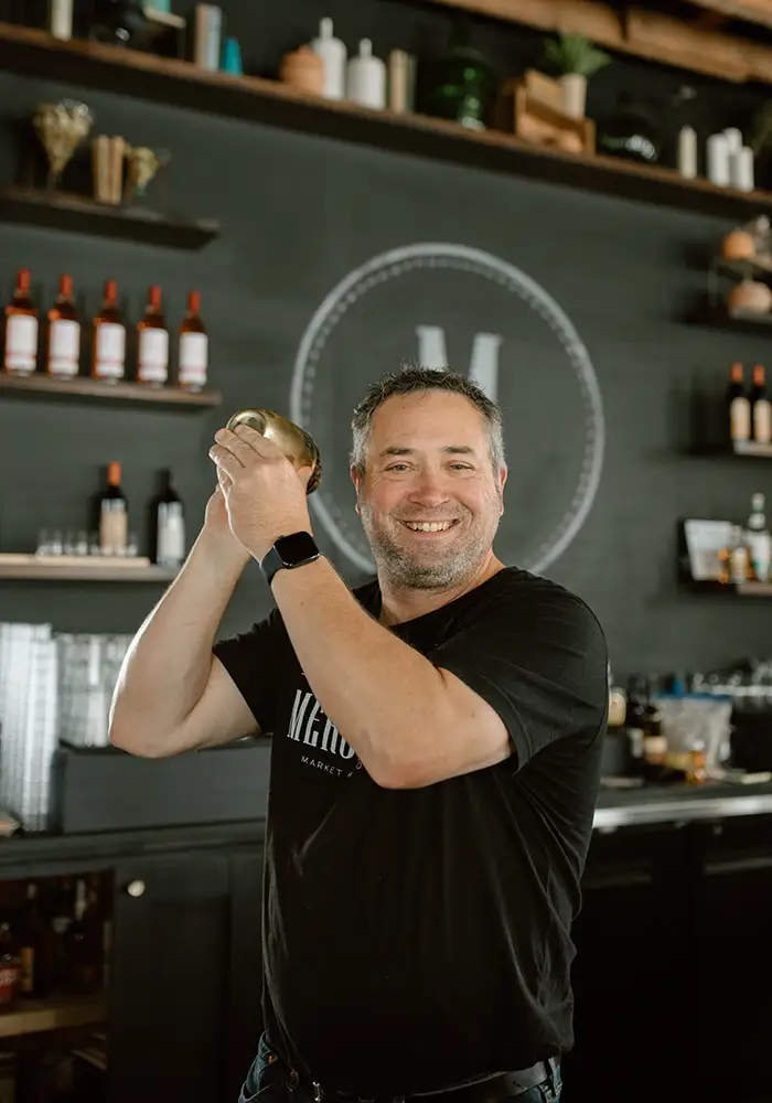 Robert Wilke shaking cocktail